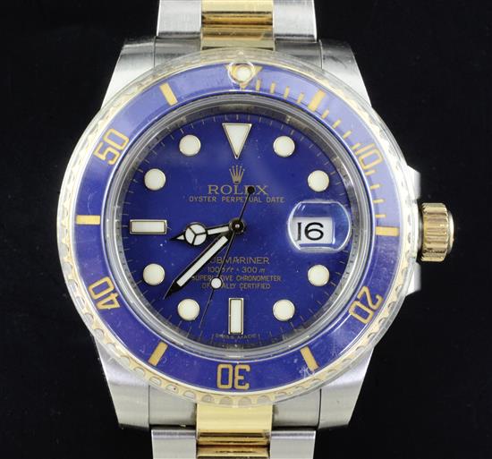 A gentlemens stainless steel and yellow gold Rolex Oyster Perpetual Date Submariner wrist watch,